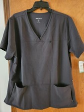 Jockey woman  s scrubs size XL 27" from shoulder to the bottom hem new