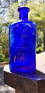 THE OWL DRUG COMPANY 6 3/8" 3 SIDED COBALT POISON BOTTLE.