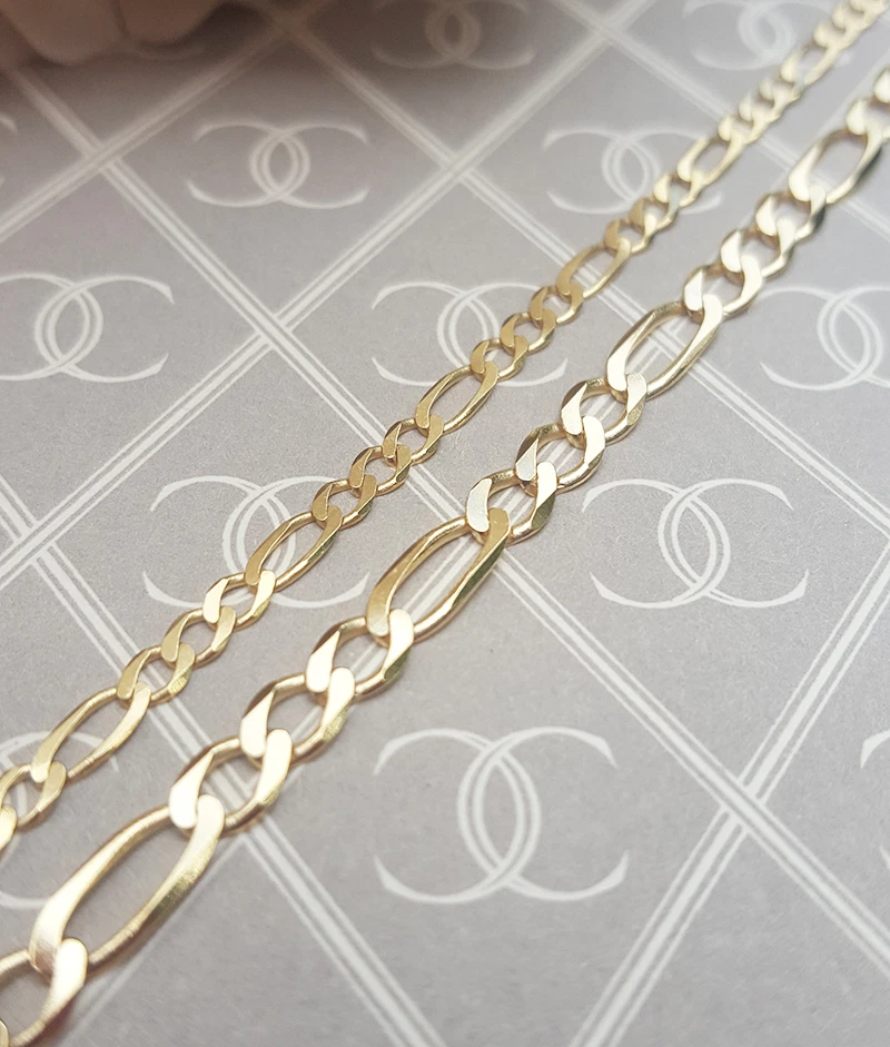 Solid gold figaro online chain