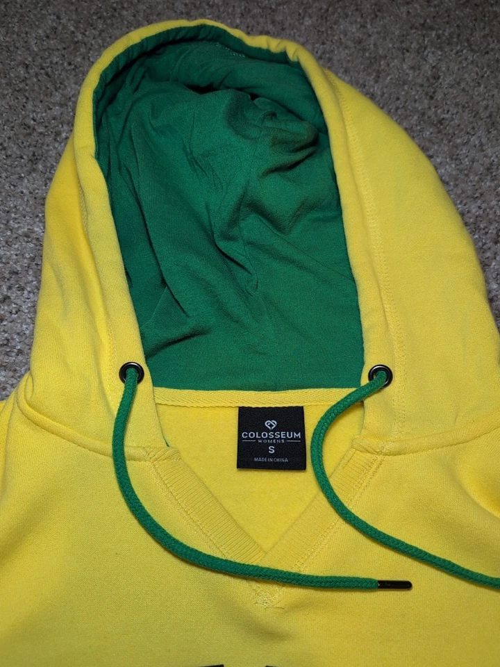 ¡Sudadera para mujer Oregon Ducks talla S con bolsillo frontal Coliseo! AMARILLO🔥NUEVO Foto 3 de 4