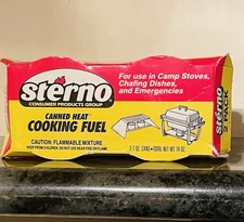 2 x7ozCans Stereo Heat Cooking Fuel. *Used* 1 can has 6.5oz & 1 can 5.6 oz left.