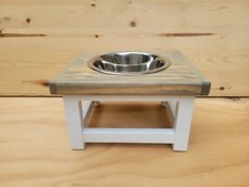 Elevated dog feeder. Dog feeding station. Dog bowl stand. Pet food bowl stand.
