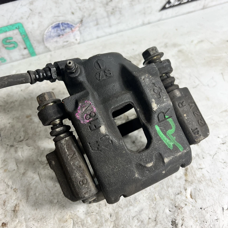 Pinza de freno delantera derecha Toyota Cressida 89-92 y disco de soporte F18N Foto 2 de 4