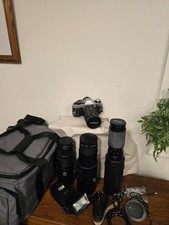 Canon AE-1 35mm SLR Film Camera with Canon Accessories, Cases, Lenses