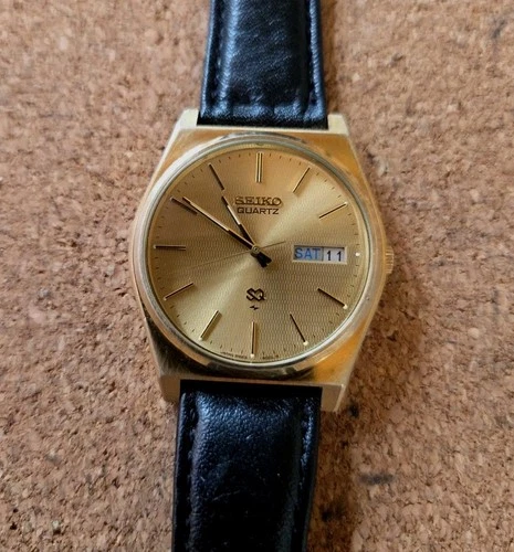 Seiko Men's Vintage SQ 6923-8009 Quartz Watch with Day/Date Gold Tone Dial