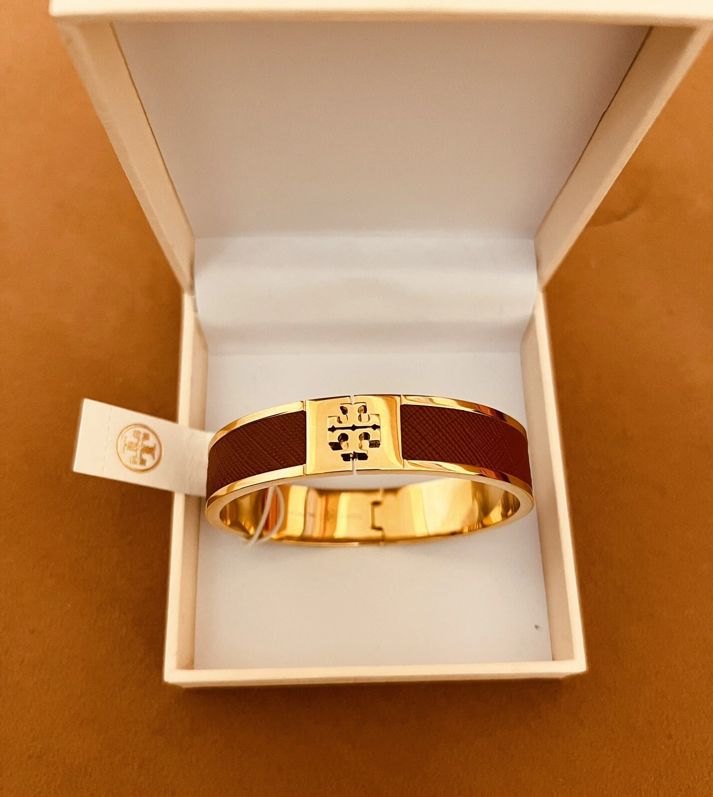 Bracciale Tory Burch in pelle con cerniera intarsiata bordeaux braccialetto in metallo tono oro