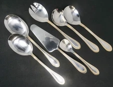 Golden Beaded Edge Stainless Steel Serving set of 7.