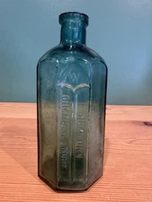 ANTIQUE RUMFORD CHEMICAL WORKS TEAL 8 SIDED MEDICINE BOTTLE