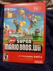 New Super Mario Bros. Wii + Super Mario Bros. History (1985-2010)