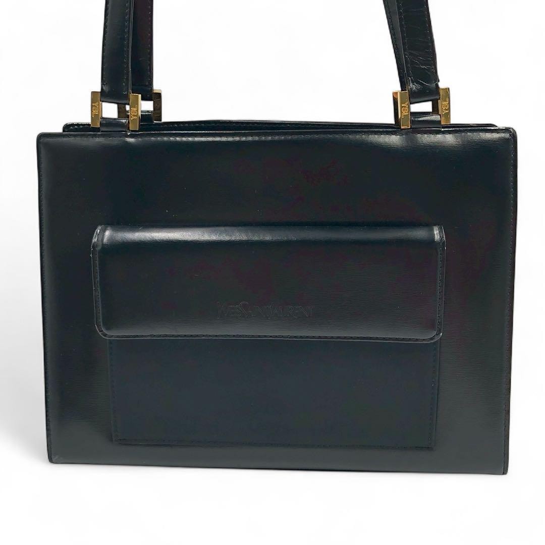 Borsa Yves Saint Laurent in pelle con logo in pelle curva vintage in metallo dorato