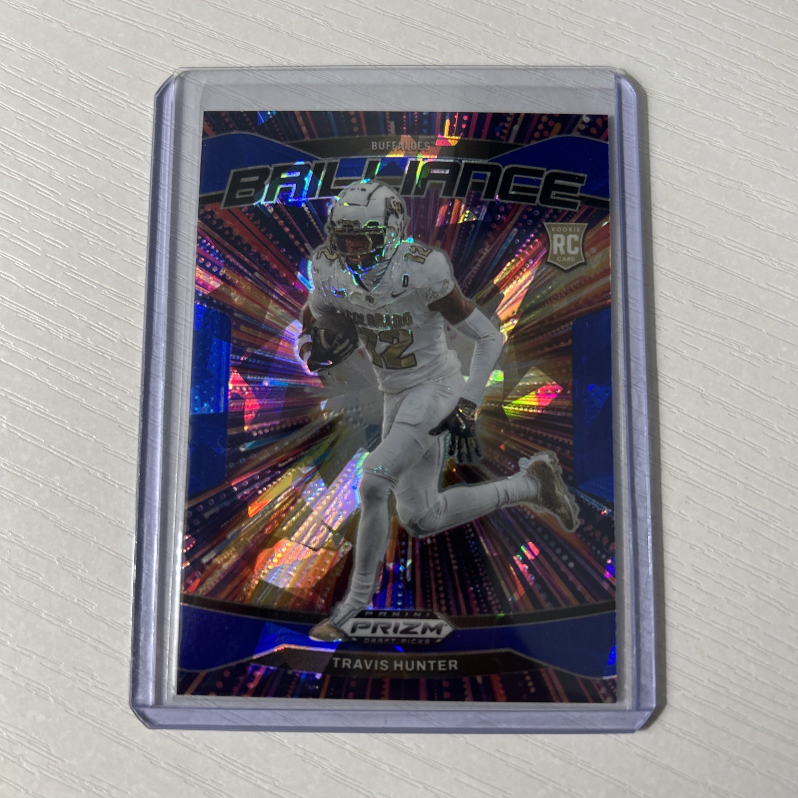 2025 Panini Prizm Draft Picks Travis Hunter Blue Ice Brilliance RC /149