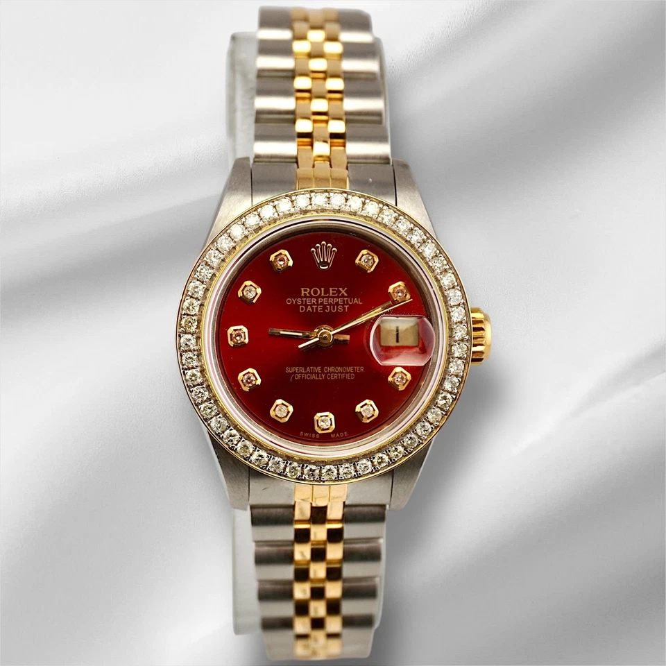 Reloj Rolex Datejust para dama 26 mm oro 18k y acero 1,25 quilates diamantes esfera roja 69173