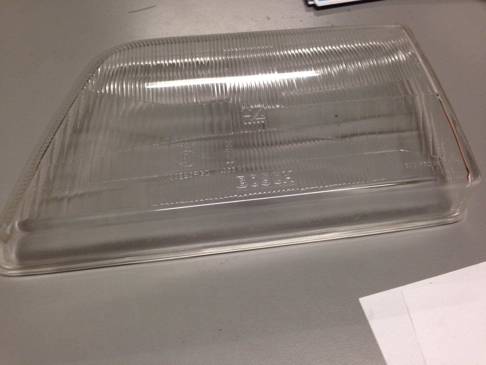 Verre de phare gauche H4 Opel Ascona lentille Bosch 1305620487 ancienne