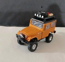  Greenlight  (CUSTOM)(LIFTED) (OFF-ROAD) 1:64 Scale 1974 Jeep DJ-5 