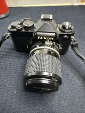 Nikon FE 35 MM Vintage Film Camera Black Body And Zoom Lens - Tested/Works