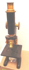 BAUSCH & LOMB  MICROSCOPE WITH LENSES