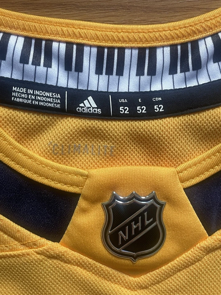 Camiseta deportiva auténtica Adidas de los Nashville Predators Ryan Johansen de la NHL Home Gold Foto 3 de 4