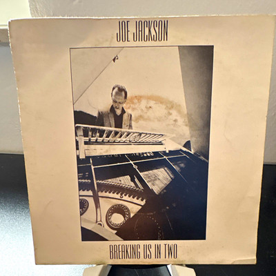 Joe Jackson - Breaking Us in Two 7'' Single 45 U/min A&M AMS 9227 (1982)