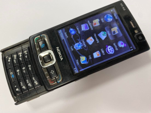 Nokia N95 - Smartphone mobile argent et noir (débloqué) entièrement fonctionnel - Photo 1/10