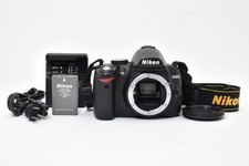 4,719 photos, beautiful Nikon D3000 body 21380