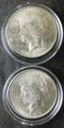 Two 1923 $1 Peace Silver Dollars in Capsules