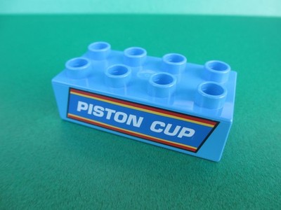 Lego Duplo Stein Sonderstein blau bedruckt Piston Cup 2 x 4  (301124E1)