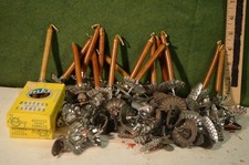 34 candle holders (swivel) , candels for a Christmas tree,anotherlot of 22added