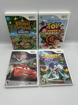 Nintendo Wii Game Lot of 4 Animal Crossing, Toy Story Mania, Cars, Sonic Colors