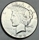 1928 key date PEACE silver dollar. VF-XF, cleaned. #nkr1