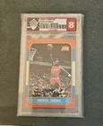 MICHAEL JORDAN ROOKIE CARD 1986-87 FLEER #57- Holograding Graded 8