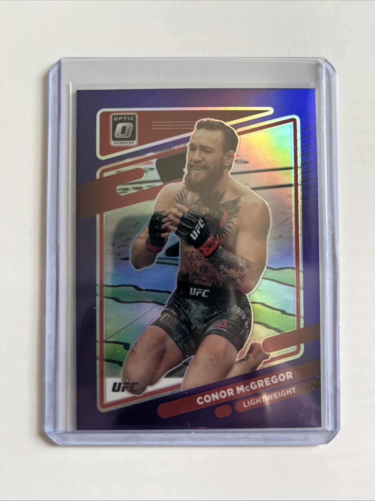 Conor McGregor 2022 Panini Donruss Optic UFC - #75 Purple Prizm a07