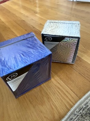 Four brand new in plastic gift boxes 