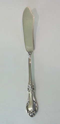 INTERNATIONAL "WILD ROSE, NEW" STERLING SILVER MASTER BUTTER KNIFE, 35 grams