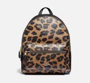 coach cheetah backpack HOKMAH Leopard Print for Women Signature coated canvas printed coated canvas and refined pebble leather Inside zip and multifunction pockets Double zip closure fabric lining Handle with 1 1/2 drop Outside zip and open pockets Adjustable shoulder straps 7 3/4 (L) x 8 3/4 (H) x 3 1/2 (W) Style No. Coach Leopard Back Pack Coach