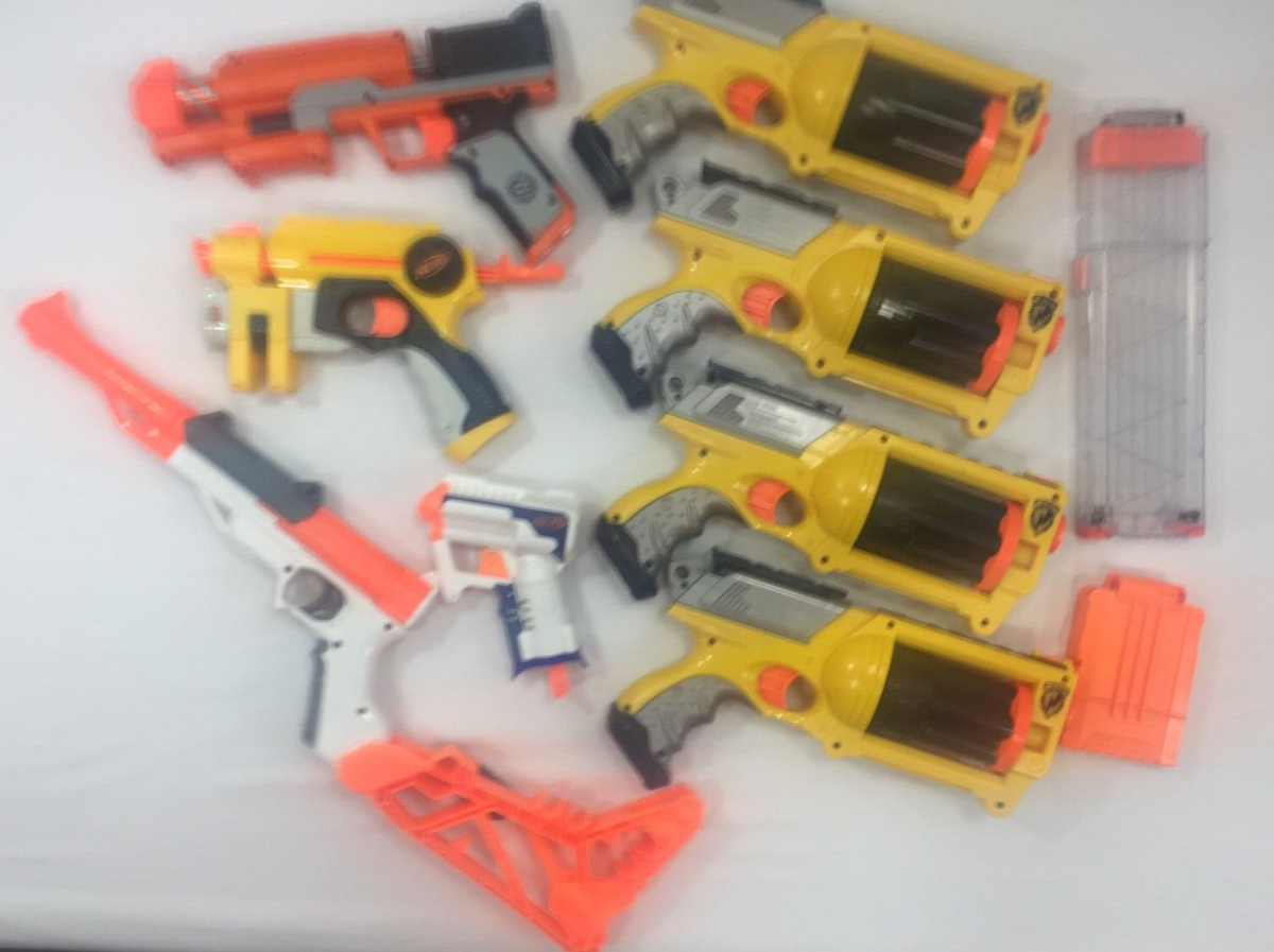 Lot of 8 Nerf Guns Sharpfire Maverick Rev 6 Zombie Strike Nite