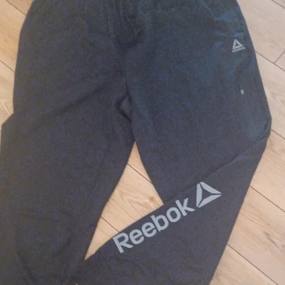 ALTRA Pantaloni da jogging Reebok da uomo neri gamba affusolata tasche zip usati in ottime condizioni XL
