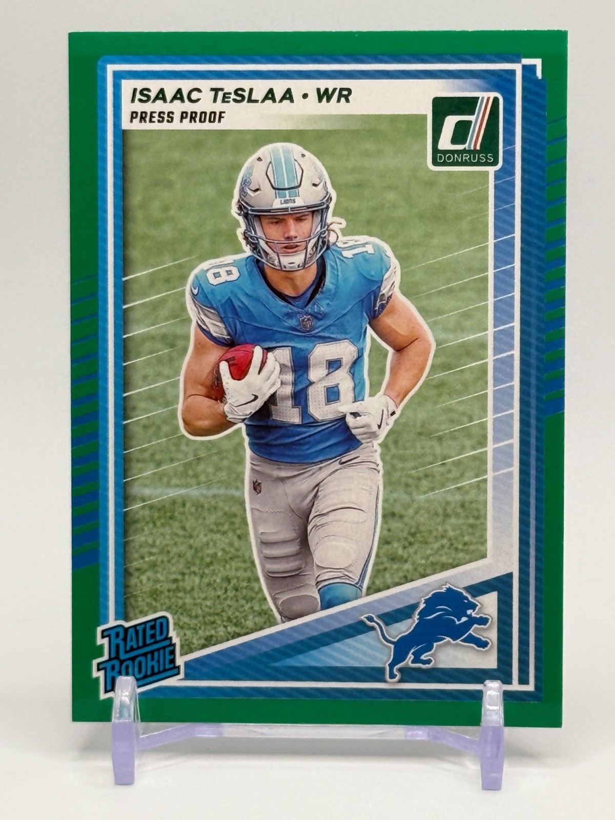 2025 Panini Donruss Isaac Teslaa Rated Rookie Green Press Proof #338 Lions