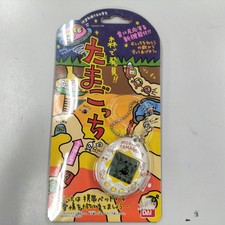 Discovered in the Forest Tamagotchi Model White x Yellow BANDAI