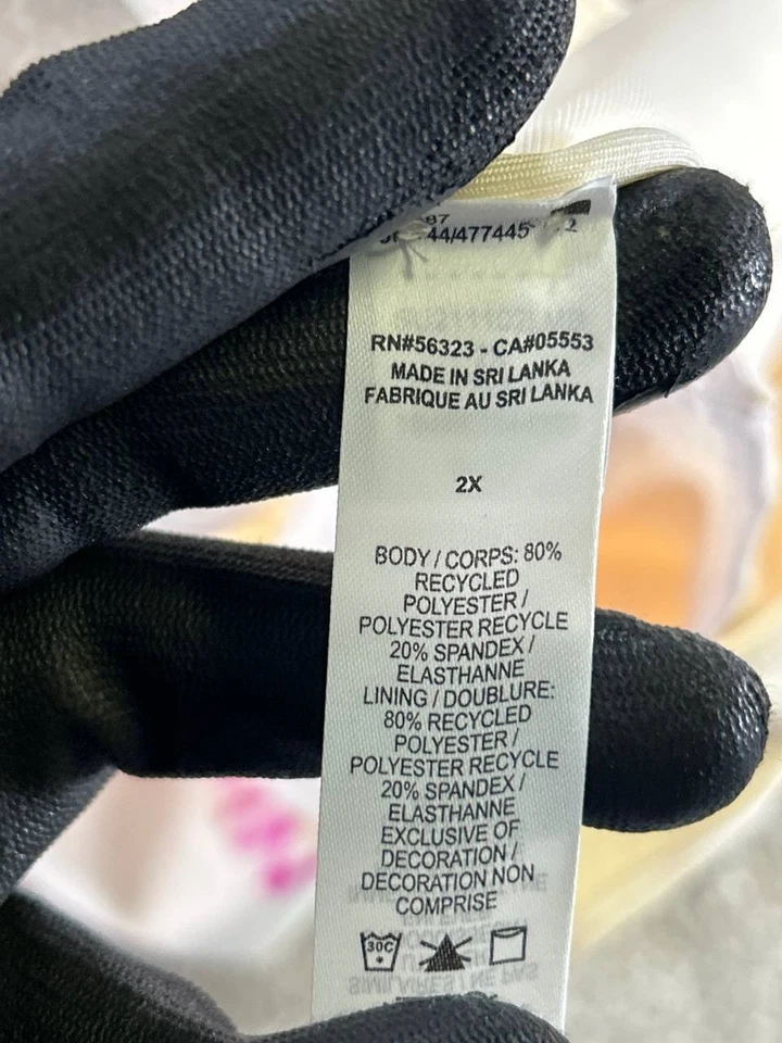 Camiseta sin mangas recortada Dri-Fit beige púrpura Nike para mujer 2x Foto 4 de 4