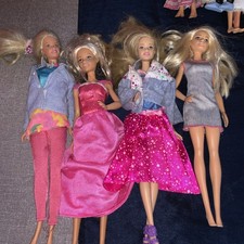 Large Barbie doll lot plus accessories 14 in total and new dresses 