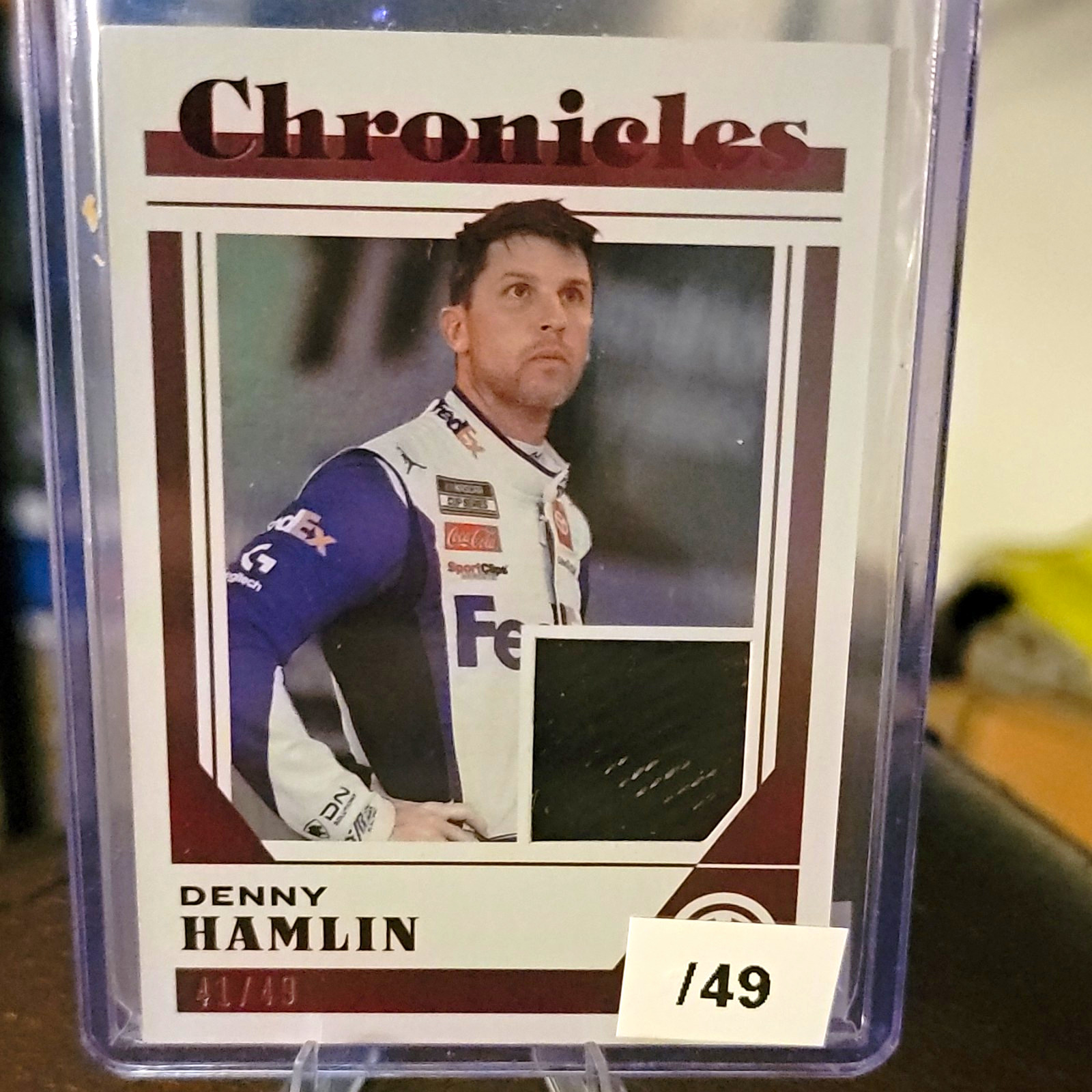 Panini 2023 Chronicles Denny Hamlin NASCAR Chronicles Swatches Red #CS-DH /49