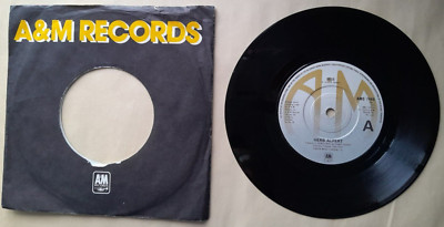 HERB ALPERT   - RISE -  7  -  VG+    A& M .  1979. Solid centre