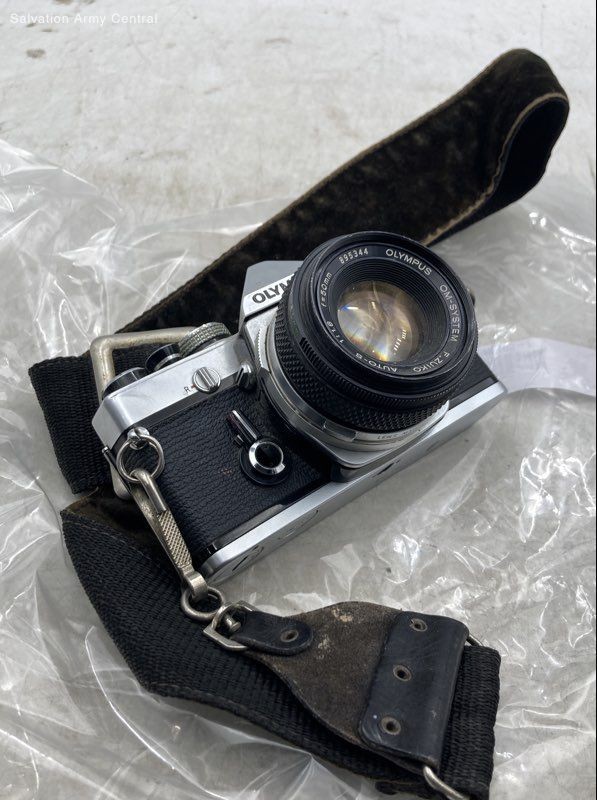 Vintage Olympus OM-1 Silver Collectible 35mm SLR Film Camera With Strap