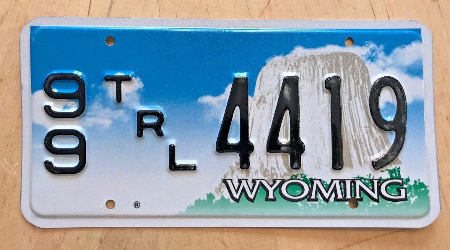 WYOMING UHAUL RENTAL TRAILER GRAPHIC LICENSE PLATE " 99 TRL 4419