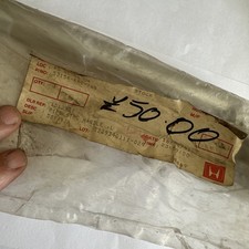 NOS Part HONDA NS125R handlebar holder left side 53154-KR1-860 sealed bag.
