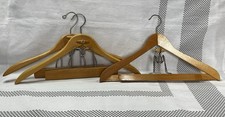 3 Vintage wooden suit hangers with trouser clamp