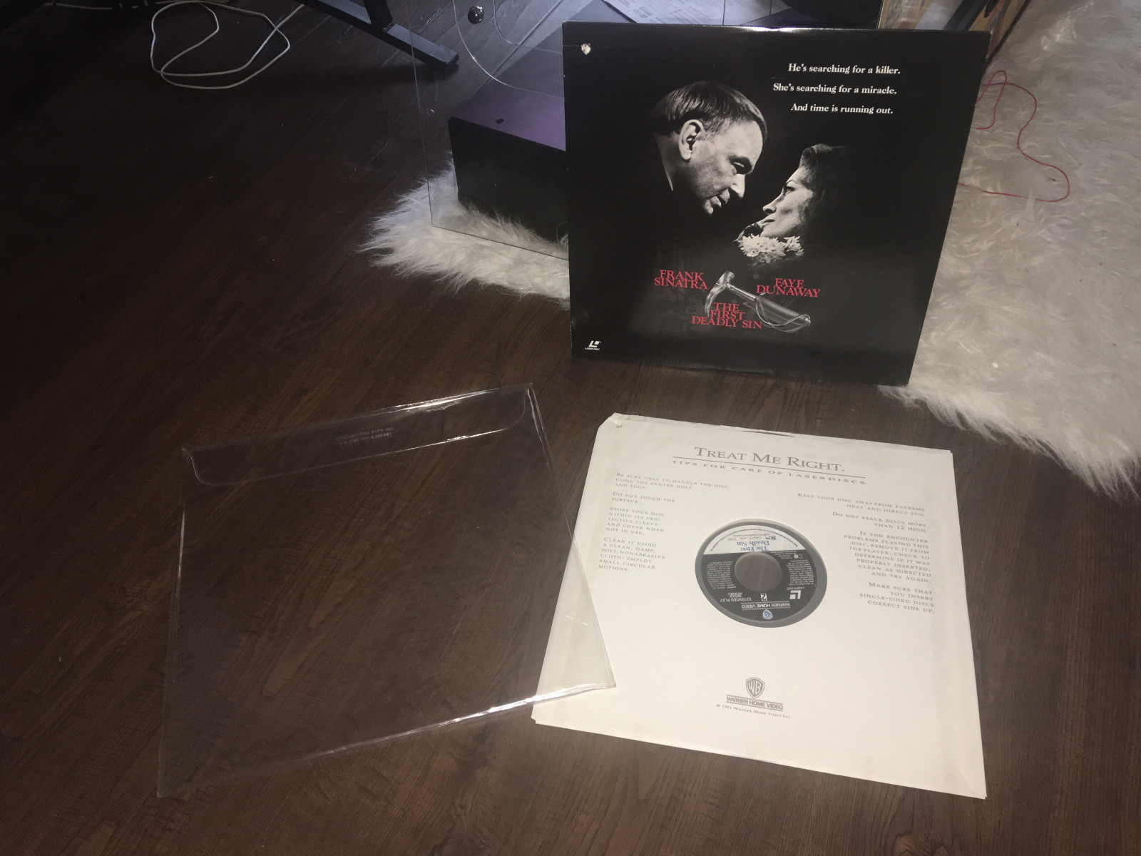 LASERDISC LASER DISC WITH PROTECTIVE SLEEVE THE FIRST DEADLY SIN