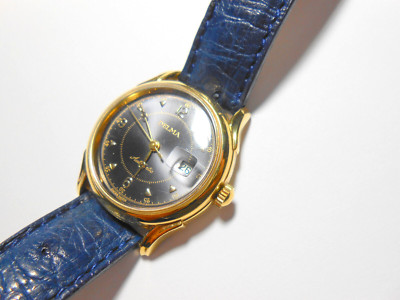 DELMA Automatic, Twenty Five 25, Armbanduhr, blaues Zifferblatt, vergoldet.