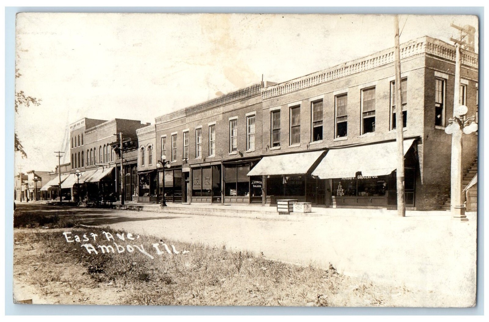 1916 East Avenue Saloon Stores Amboy Illinois IL RPPC Photo Antique