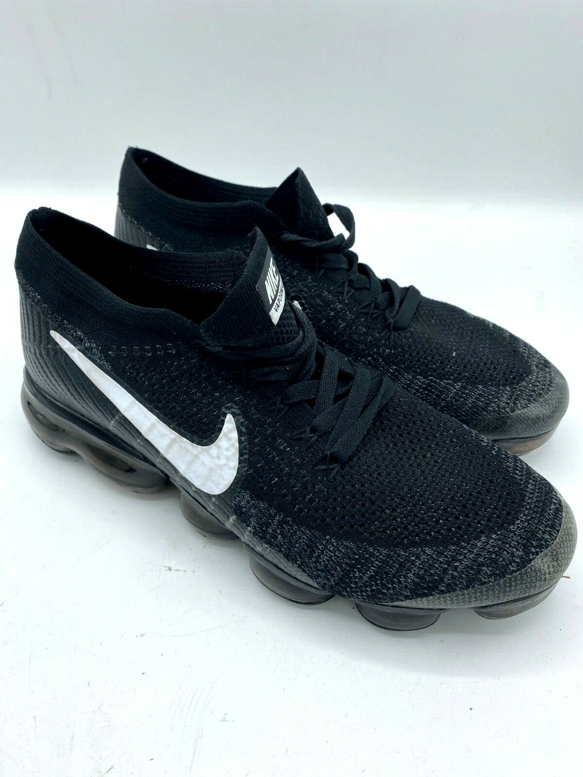 vapormax black with white swoosh